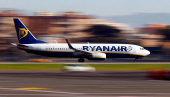 FILE PHOTO: A Ryanair aircraft lands at Ciampino Airport in Rome