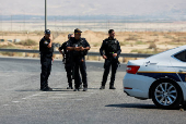 Israeli police patrol the area near Allenby Bridge Crossing between the West Bank and Jordan following a shooting incident at the crossing in the Israeli-occupied West Bank