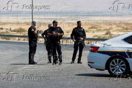 Israeli police patrol the area near Allenby Bridge Crossing between the West Bank and Jordan following a shooting incident at the crossing in the Israeli-occupied West Bank