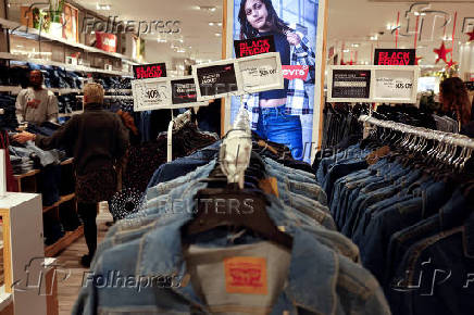 Black Friday sale signs are shown at Macy?s department store