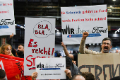 German Chancellor Olaf Scholz attends a works council meeting at a Ford plant in Cologne