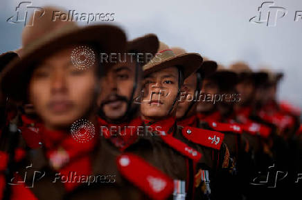 Members of Indian paramilitary force Assam Rifles march during a rehearsal for the upcoming Republic Day parade in New Delhi