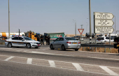 Israeli police patrol the area near Allenby Bridge Crossing between the West Bank and Jordan following a shooting incident at the crossing in the Israeli-occupied West Bank