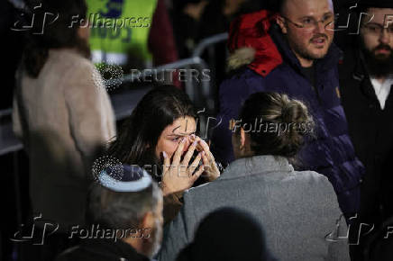 Mourners attend the funeral of Israeli rabbi, Zvi Kogan, in Kfar Habad