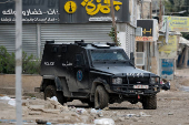 Palestinian security forces operate at the camp in Jenin