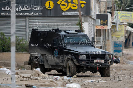 Palestinian security forces operate at the camp in Jenin