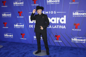 El negro y los diseos clsicos intervenidos dominaron la alfombra de los Latin Billboards