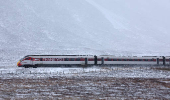 The Inverness to London train makes its way through the Drumochter pass, Scotland