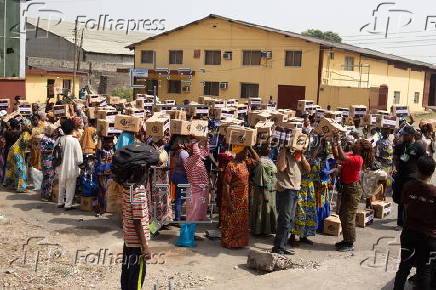 Boxes of supplies are distributed to the poor in Lagos