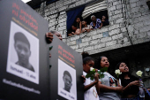 Families of four boys found dead hold vigil, in Guayaquil