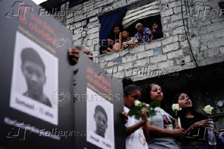 Families of four boys found dead hold vigil, in Guayaquil