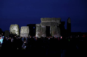 Revellers attend winter solstice celebrations at Stonehenge stone circle near Amesbury