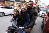 Pakistan's Christian minority dressed up as Santa hold rally in Peshawar