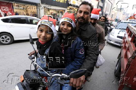 Pakistan's Christian minority dressed up as Santa hold rally in Peshawar