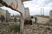 Syrian Civil Defense team clears unexploded ordnance in Idlib countryside