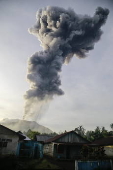 Mount Ibu volcano erupts in Indonesia