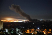 Smoke billows over Beirut's southern suburbs, after an Israeli strike