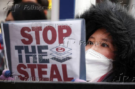 Pro-Yoon protesters participate in a rally outside a court, in Seoul