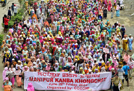 People take part in a rally organised by the Coordinating Committee on Manipur Integrity (COCOMI) in Imphal, Manipur