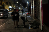 Anjos da Noite (Night Angels) NGO distributes food to homeless people on Christmas Eve in Sao Paulo