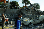 Aftermath of an Israeli strike, in the town of Almat