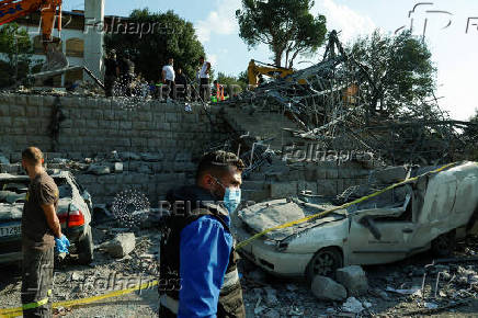 Aftermath of an Israeli strike, in the town of Almat