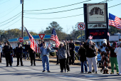 Former U.S. President Carter's casket travels to Atlanta, Georgia