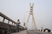 A woman jogs along the Lekki-Ikoyi Link Bridge in Lagos