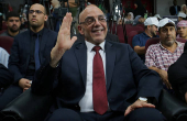 Presidential candidate, Abdel-Ali Hassani Cherif, greets his supporters during his campaign rally in Tizi-Ouzou