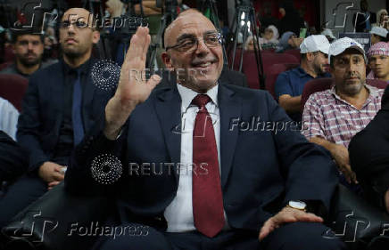 Presidential candidate, Abdel-Ali Hassani Cherif, greets his supporters during his campaign rally in Tizi-Ouzou