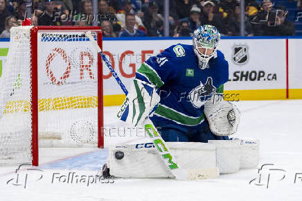 NHL: Calgary Flames at Vancouver Canucks