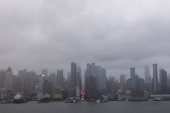 Clouds are pictured over the skyline of New York during a rainy day as it is seen from Weehawken, New Jersey