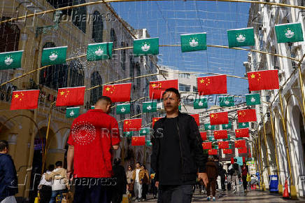 Macau and Chinese flags hang at Senado Square, in Macau