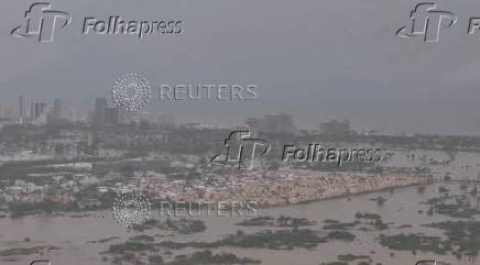 The Diamante zone is flooded due to the impact of Storm John, in Acapulco, Guerrero