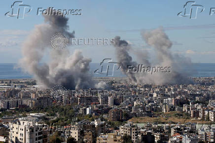 Smoke billows in Beirut's southern suburbs, after an Israeli strike