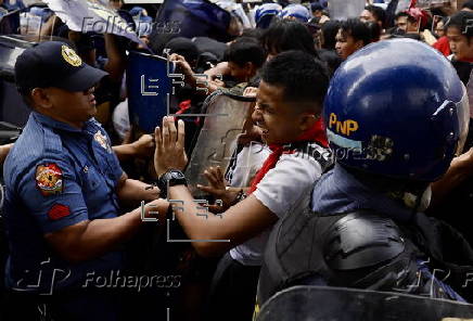 Protesters mark the 161th birth anniversary of hero Andres Bonifacio