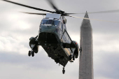 U.S. President Joe Biden and Jill Biden arrive on the South Lawn of the White House