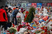 Mourners gather at victims' memorial six days after Krasnogorsk attack