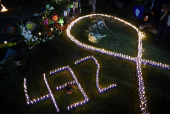 Demonstrators hold a vigil ahead of International Day for the Elimination of Violence Against Women, in Guatemala City