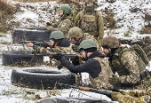 Ukrainian civilians undergo basic military training in Kharkiv