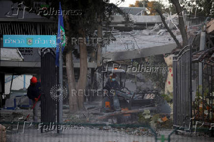 Scenes from a damaged site after a projectile fired from Yemen was intercepted, in Ramat Gan