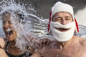 Traditional pre-Christmas swim in Geneva