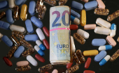 Illustration shows Euro banknotes and medicines