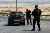 Israeli police patrol the area near Allenby Bridge Crossing between the West Bank and Jordan following a shooting incident at the crossing in the Israeli-occupied West Bank