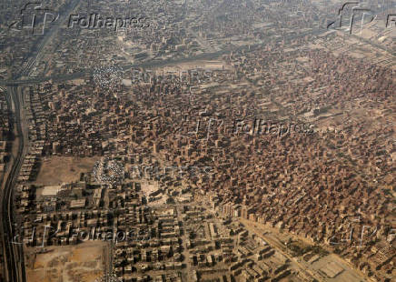 An aerial view shows Cairo's traffic and buildings