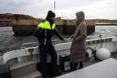 People vote in Ireland's general election, on the island of Gola