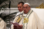 Pope celebrates a mass the day after elevating new cardinals, at the Vatican