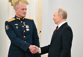 Russian President Vladimir Putin attends an awarding ceremony in Moscow