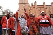 Pakistan's Christian minority dressed up as Santa hold rally in Peshawar