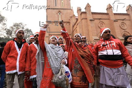 Pakistan's Christian minority dressed up as Santa hold rally in Peshawar